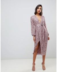 ASOS Robe mi-longue avec ruban à nouer à la taille et sequins sur l'ensemble - Rose