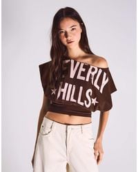 Bershka - – kurzärmliges, asymmetrisches t-shirt - Lyst