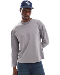 Another Influence - – locker sitzendes, langärmliges shirt - Lyst