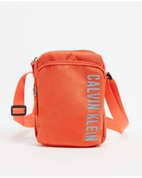Calvin Klein Performance – Umhängetasche - Orange