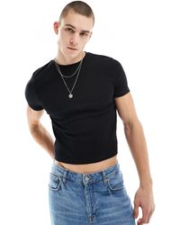 ASOS - T-shirt corta attillata girocollo nera a coste - Lyst