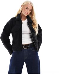 ONLY - Veste coupe carrée en bouclé à fermeture éclair - Lyst