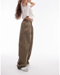 TOPSHOP - Pantalon plissé ultra ample en popeline - kaki - Lyst