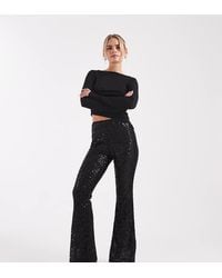 ASOS - Pantalones De Campana Negros De Malla Transparente Con Lentejuelas De Asos Design Petite - Lyst