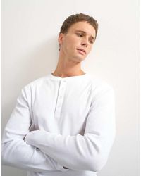 TOPMAN - Slim Fit Long Sleeve Rib Knit Henley Neck T-shirt - Lyst