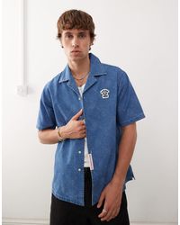 Aape By A Bathing Ape - Aape by a bathing ape - chemise en jean à manches courtes avec broderie au dos - délavé - Lyst