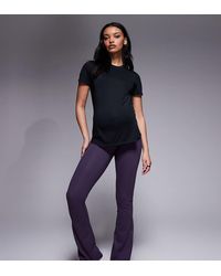 4505 - Leggings Morados Para Yoga De Talle Alto Y Corte Slim Acampanado De Tejido Suave Icon De Maternity - Lyst