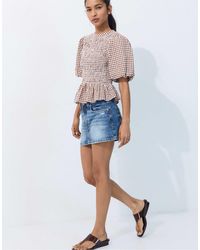 Stradivarius - Kurzärmlige bluse mit schößchen - Lyst