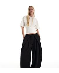 Bershka - Neoprene Effect Wide-leg Trousers With Stoppers - Lyst
