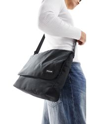 French Connection - Bolso messenger negro clásico fcuk - Lyst
