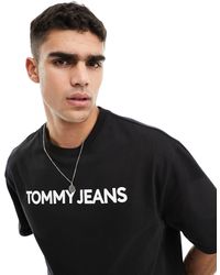 Tommy Hilfiger - Camiseta negra extragrande con logo bold classics - Lyst