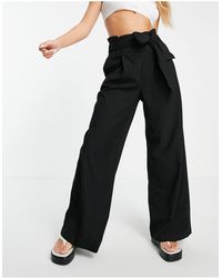 Pantalones, pantalones de vestir y chinos Mango de mujer: hasta el 60 % de  descuento | Lyst