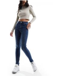 Pimkie - Jeans skinny a vita alta lavaggio medio - Lyst