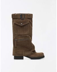 Bershka - – flache hosenstiefel - Lyst