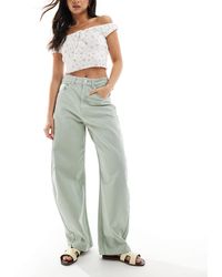 ASOS - Jean coupe ample à taille haute - kaki clair - Lyst