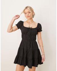 ASOS - Soft Denim Smock Tiered Mini Dress With Tie Detail - Lyst