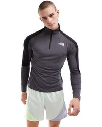 The North Face - Training - top con zip corta - Lyst
