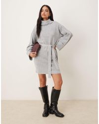 VILA Petite tie waist high neck knit mini dress in black