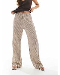 New Look - Gestreepte Broek Met Wijde Pijpen - Lyst
