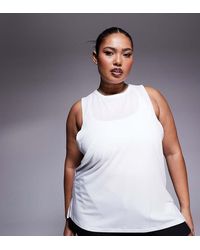 4505 - Camiseta Deportiva Blanca Sin Mangas Con Sisas Caídas De Tejido De Secado Rápido Icon De Curve - Lyst