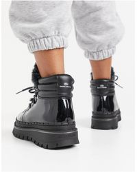 sketchers lace up boots