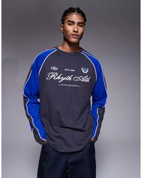 ASOS - T-shirt manches longues oversize à empiècements et motifs sport - anthracite et bleu - Lyst