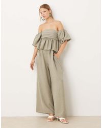 ASOS - Bardot Extreme Puff Sleeve Peplum Jumpsuit - Lyst