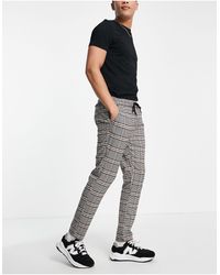 Pantalones ajustados a cuadros en marrón Bershka de Denim de color Marrón  para hombre | Lyst