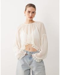 SNDY'S - Chiffon Curved Ruffle Hem Top - Lyst