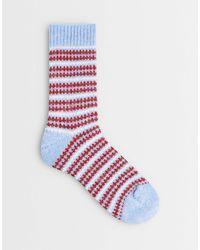 Pieces - Chaussettes en maille à motif clair et rouge - Lyst