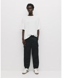 Pull&Bear - Joggers Cargo Neri - Lyst