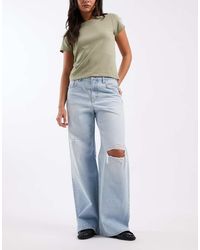 Calvin Klein - Low Rise Baggy Jeans With Rip Details - Lyst