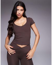 4505 - Icon V Neck Performance Baby T-shirt - Lyst