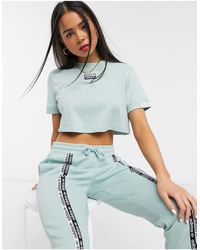 adidas originals ryv taping cropped jacket in blush