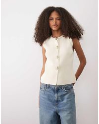 Mango - Knitted Vest With Sun Statement Buttons - Lyst