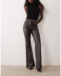 Mango - Flared Leather Look Pants - Lyst