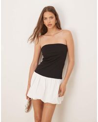 Vila - Mini-Jurk Met Contrasterende Bolle Rok - Lyst