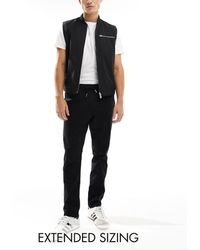 ASOS - Pantalones Negros De Corte Tapered Sin Cierres Con Cinturilla Elástica De - Lyst