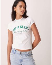 Calvin Klein - Heritage Logo Baby Tee With Emerald Script Writing - Lyst