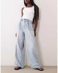 ARMANI EXCHANGE - Jeans Met Wijde Pijpen En Dubbele Plooien - Lyst