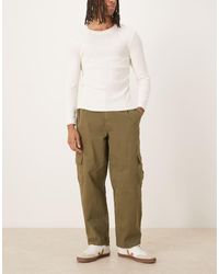 ASOS - Pantaloni Cargo Affusolati Vestibilità Comoda Kaki Con Pieghe - Lyst