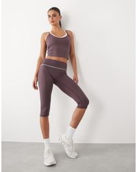 4505 - Active Low Rise Capri legging With Piping Detail - Lyst