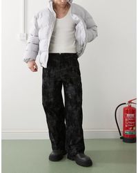 Collusion - – weite jeans mit mehrfarbigem, beflocktem military-muster - Lyst