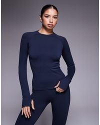 4505 - Top manches longues sans coutures effet sculptant - indigo - Lyst