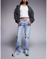 Juicy Couture - Skinny Diamante Logo Low Rise Jeans - Lyst