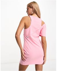 Calvin Klein - Vestido corto rosa con abertura exclusivo en asos - Lyst