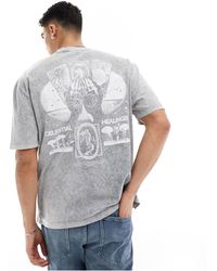 ASOS - Camiseta lavado extragrande con estampado celestial en la espalda - Lyst