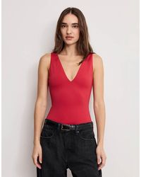 GOOD AMERICAN - V-neck Sculpting Bodysuit - Lyst