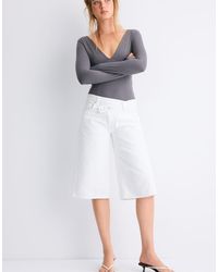 Stradivarius - V-neck Bodysuit With Under-bust Gathering - Lyst