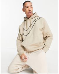 Sudadera con capucha negra con logo metalizado Just Do It Nike de Algodón  de color Negro para hombre | Lyst